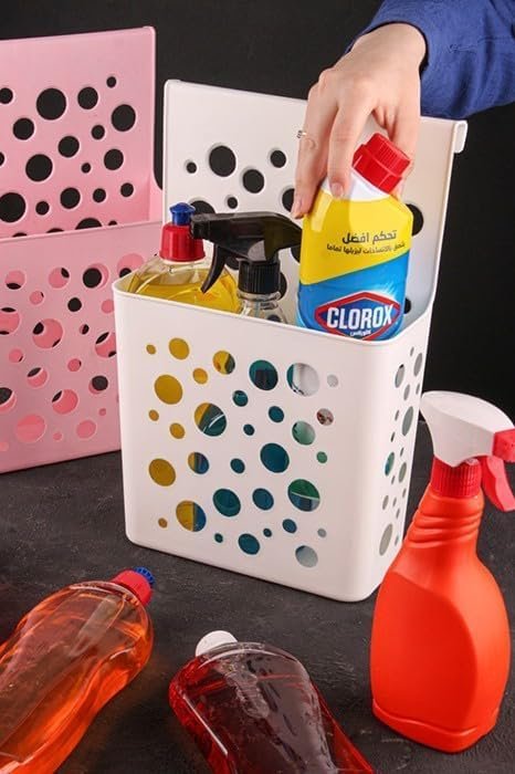 A hanging basket from the inside of the kitchen door to organize the location of detergents